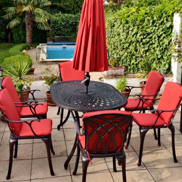 Customer photo of the June 6 seater garden table and april chairs in antique bronze with terracotta cushions and parasol